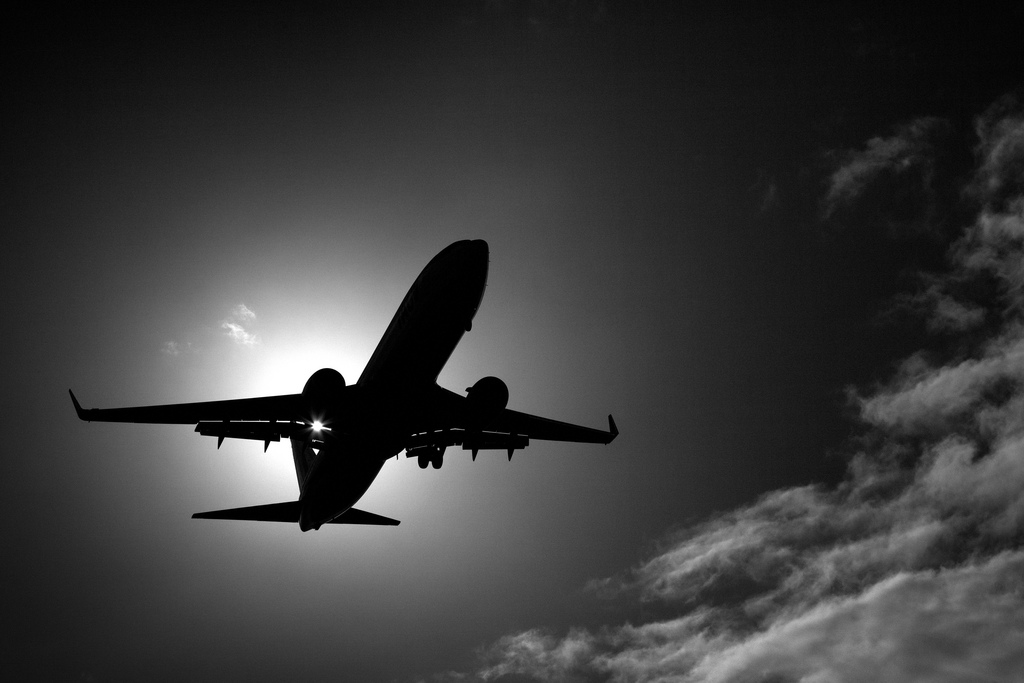 Plane-in-the-skies-1a-black-white-LLLLLL-good-photo