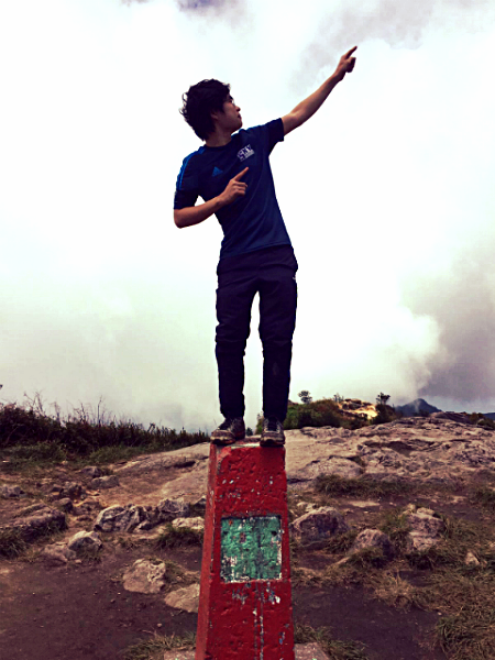 Striking a pose at the highest point in Johor. Image by Ariff aka Scott