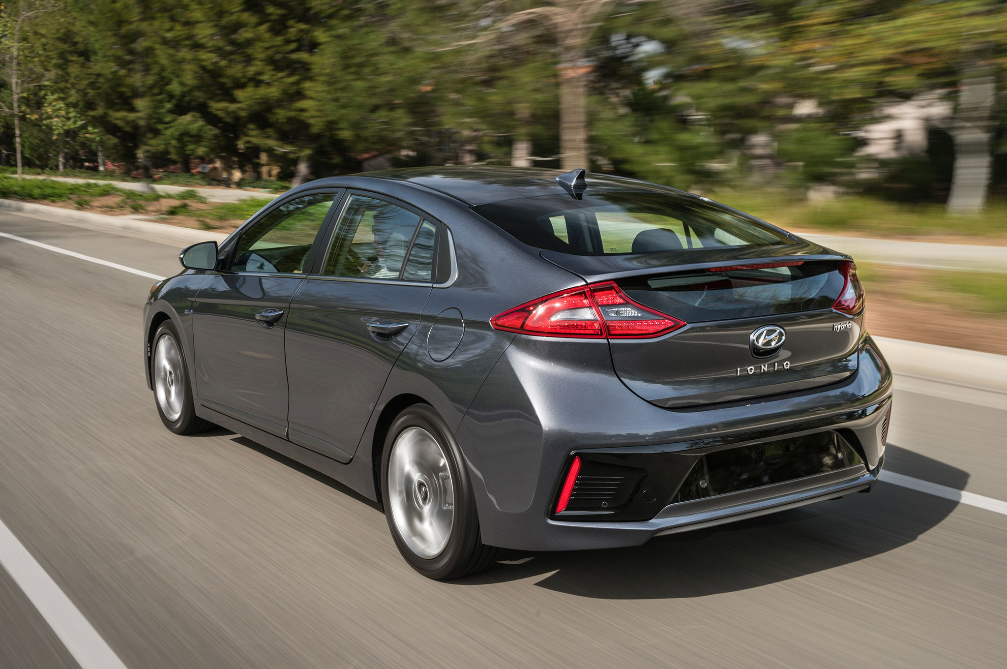 2017-Hyundai-Ioniq-Hybrid-rear-three-quarter-in-motion-01