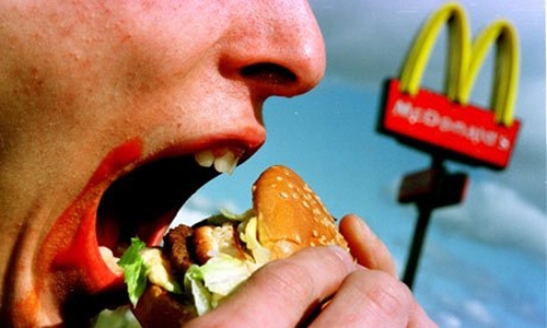 Eating-a-McDonalds-burger-004