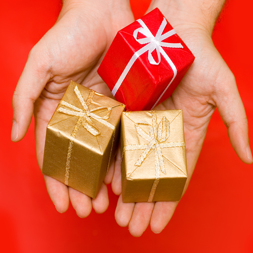 hands giving presents